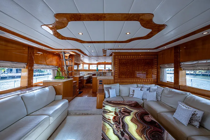 Slide: The Image of Luxurious interior of 2013 Johnson 78 Cockpit Motoryacht with elegant wood finishes and plush seating. - 18