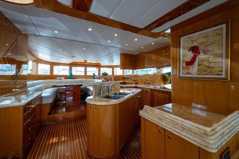Slide: The Image of Luxurious interior of 2013 Johnson 78 Cockpit Motoryacht with elegant wood finishes and modern amenities. - 23