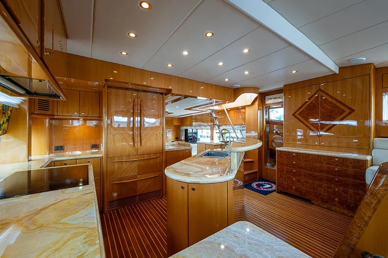 Slide: The Image of Luxurious interior of 2013 Johnson 78 Cockpit Motoryacht with elegant wood finishes. - 25