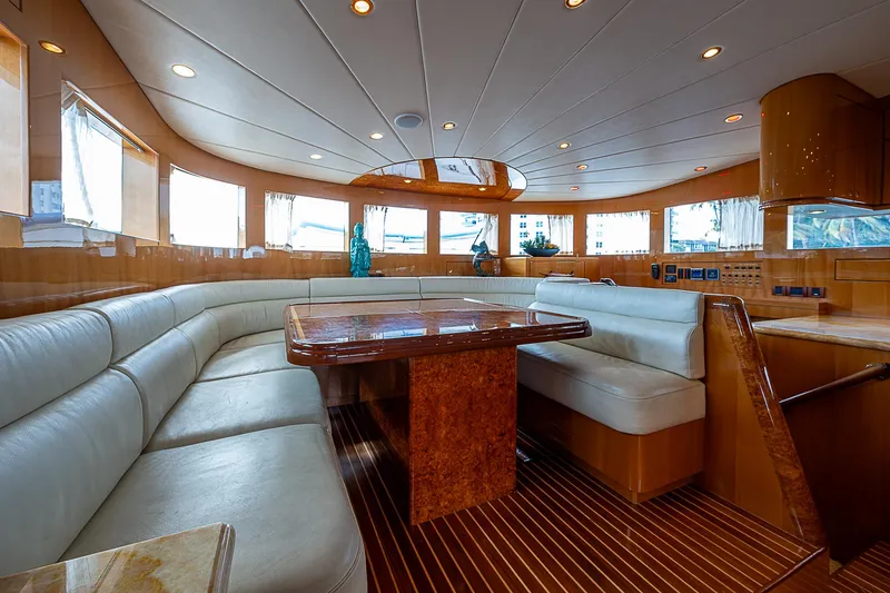 Slide: The Image of Luxurious interior of 2013 Johnson 78 Cockpit Motoryacht with elegant seating and wooden accents. - 31
