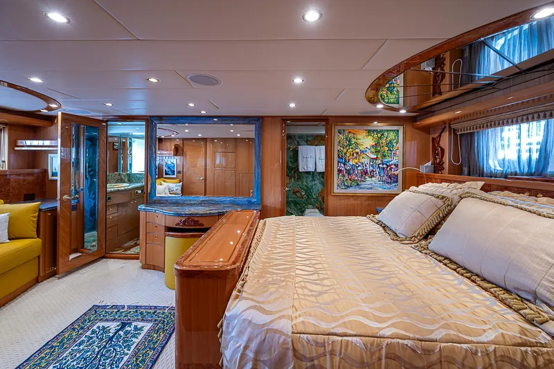 Slide: The Image of Luxurious bedroom interior of 2013 Johnson 78 Cockpit Motoryacht with elegant decor and ambient lighting. - 32