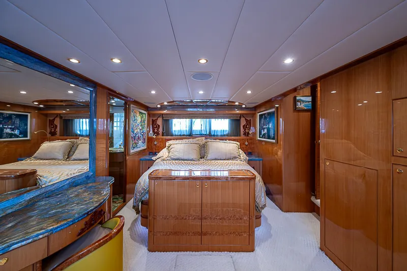 Slide: The Image of Luxurious bedroom interior of 2013 Johnson 78 Cockpit Motoryacht with elegant wood finishes. - 34