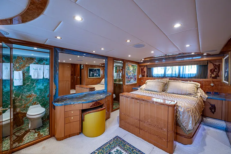 Slide: The Image of Luxurious bedroom interior of 2013 Johnson 78 Cockpit Motoryacht with elegant wood finishes. - 35
