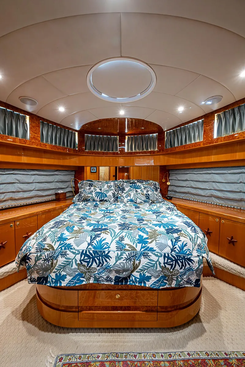 Slide: The Image of Luxurious bedroom interior of 2013 Johnson 78 Cockpit Motoryacht with elegant wood finishes. - 45