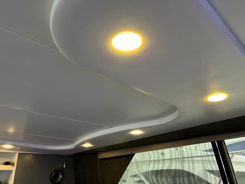 Slide: The Image of Interior ceiling lights of 1995 Cruisers Yachts 3650 ACMY, featuring modern recessed lighting. - 48