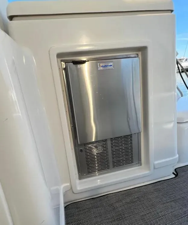 Slide: The Image of Built-in refrigerator on a 1999 Tiara Yachts 4100 Open boat deck. - 10