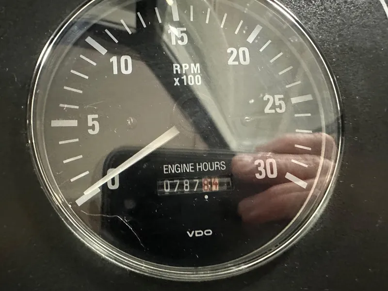 Slide: The Image of Close-up of Tiara Yachts 4100 Open 1999 tachometer showing 787 engine hours. - 25
