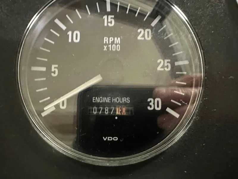 Slide: The Image of Close-up of a Tiara Yachts 4100 Open 1999 tachometer showing 787 engine hours. - 26
