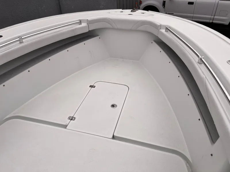 Slide: The Image of 2021 Yellowfin 26 Hybrid boat interior with storage compartment. - 4