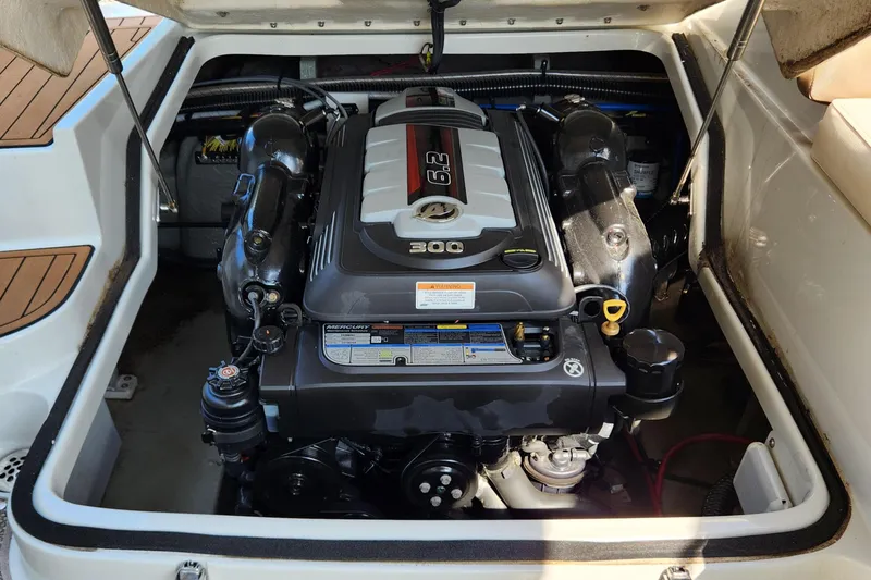 Slide: The Image of 2017 Crownline Eclipse E4 engine compartment, showcasing a powerful inboard motor. - 14