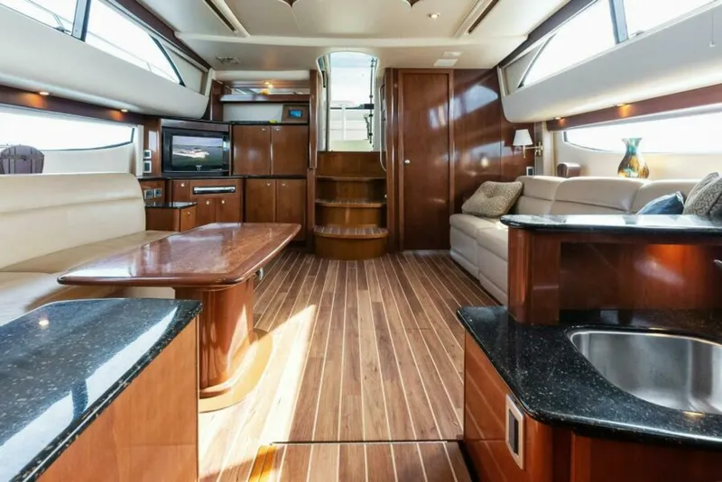 Slide: The Image of Luxurious interior of 2008 Meridian 459 Motoryacht with wood flooring and modern amenities. - 10