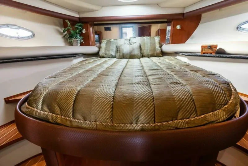 Slide: The Image of Luxurious bedroom interior of 2008 Meridian 459 Motoryacht with plush bedding. - 12