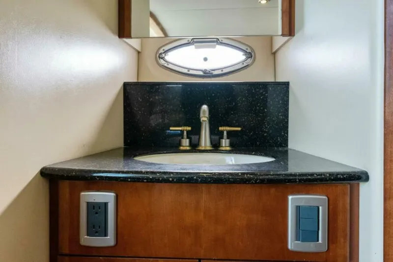Slide: The Image of 2008 Meridian 459 Motoryacht bathroom with sleek sink and modern fixtures. - 17