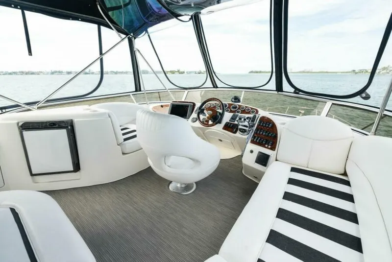 Slide: The Image of 2008 Meridian 459 Motoryacht interior with modern helm and seating. - 20