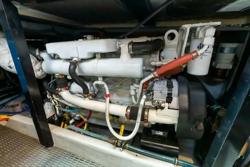 Slide: The Image of Engine room of 2008 Meridian 459 Motoryacht, showcasing detailed mechanical components. - 31