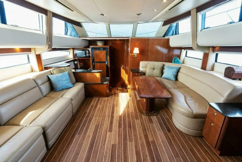 Slide: The Image of Luxurious interior of 2008 Meridian 459 Motoryacht with elegant seating and wooden flooring. - 6