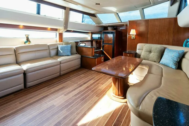 Slide: The Image of Luxurious interior of 2008 Meridian 459 Motoryacht with plush seating and wooden accents. - 7