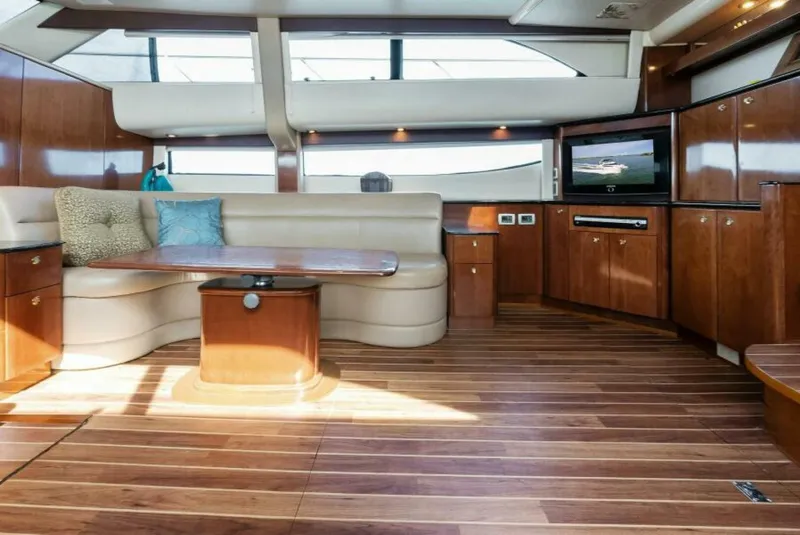 Slide: The Image of Luxurious interior of 2008 Meridian 459 Motoryacht with wood flooring and plush seating. - 8