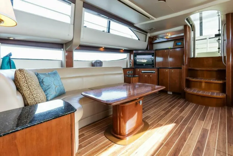 Slide: The Image of Luxurious interior of 2008 Meridian 459 Motoryacht with elegant wood finishes and comfortable seating. - 9