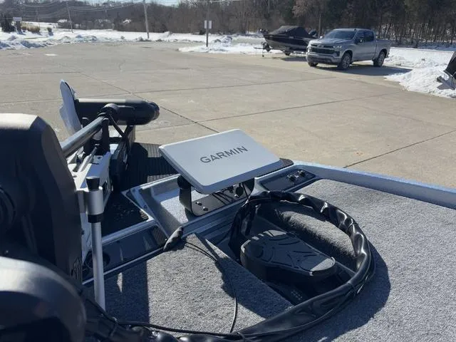 Slide: The Image of Boat deck with Garmin device on 2025 Phoenix 721 ZXL in snowy parking lot. - 8