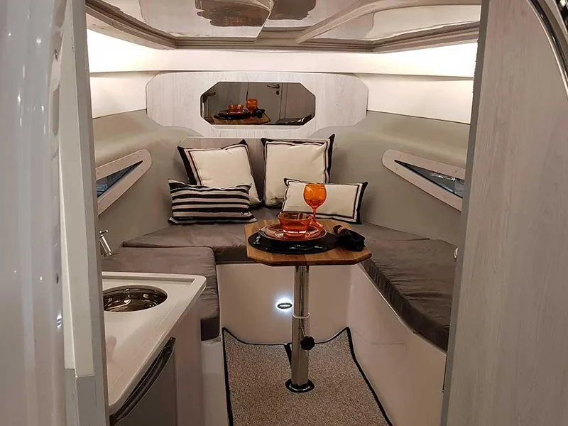 Slide: The Image of Luxurious interior of 2025 Hanover 355 Outboard boat with cozy seating and elegant decor. - 6