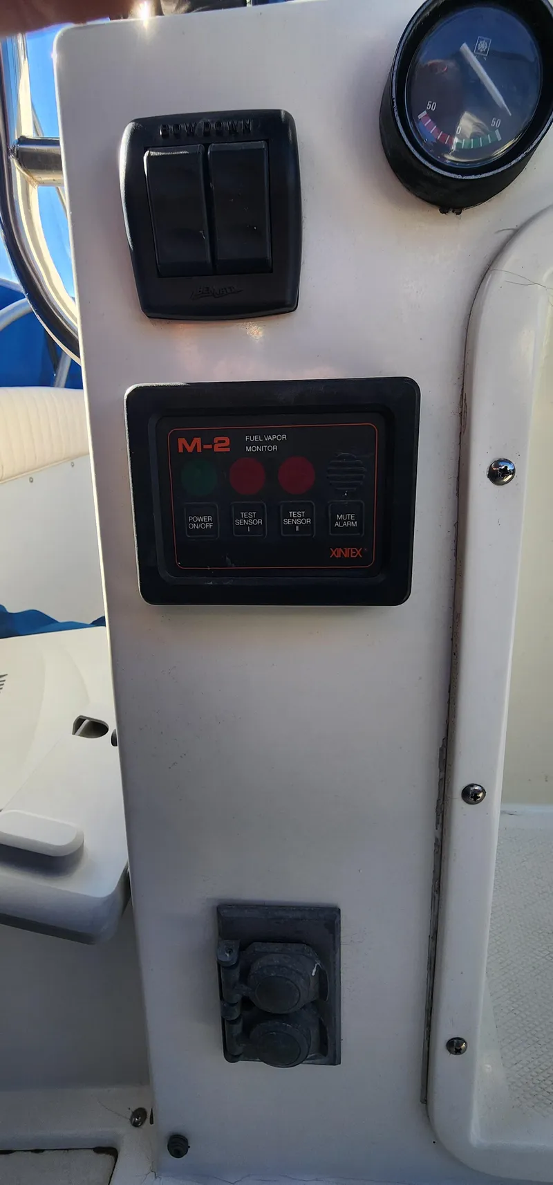 Slide: The Image of Control panel of a 1985 Bertram 33 Flybridge Cruiser boat. - 7