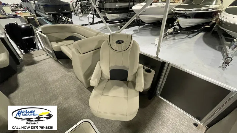 Slide: The Image of 2020 Barletta C22QC boat interior with beige seating at Marine Center, Indiana. - 11