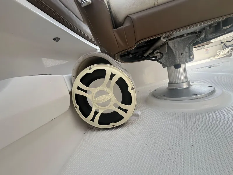 Slide: The Image of Speaker and seat base on 2013 Chaparral 257 SSX boat interior. - 24