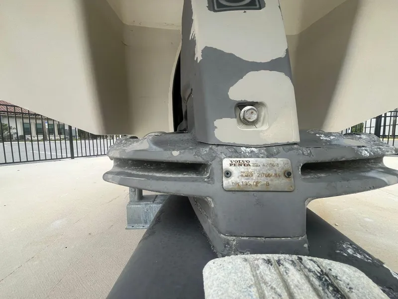 Slide: The Image of Close-up of a 2013 Chaparral 257 SSX boat's Volvo Penta outdrive. - 34