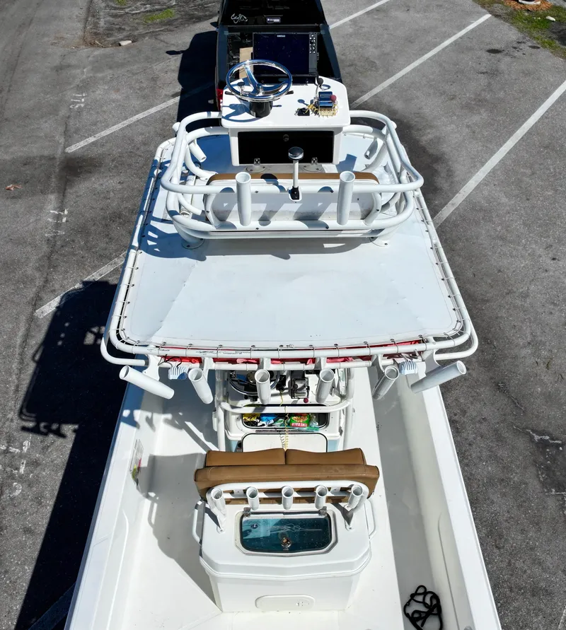 Slide: The Image of 2022 Skeeter SX230 boat with advanced fishing setup, aerial view. - 10