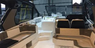 Slide: The Image of 2025 Hanover 387 Outboard Classic Luxury Edition interior with elegant seating and modern design. - 6
