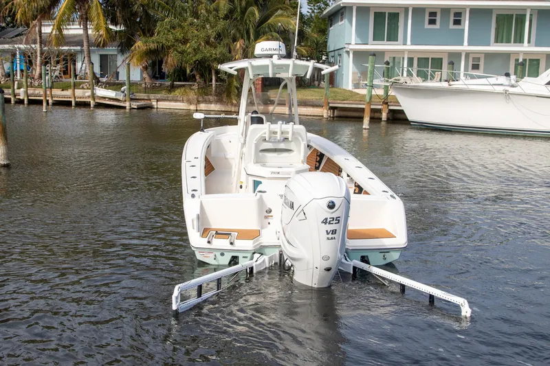 Slide: The Image of 2023 Pathfinder 2700 Open boat with Yamaha 425 V8 engine on water. - 2