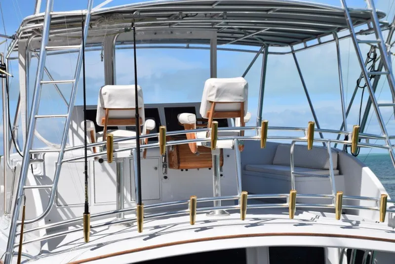 Slide: The Image of Flybridge with rod storage on aft railings - 53