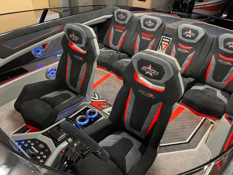 Slide: The Image of Luxurious interior of 2021 Daves Custom Boats M-37R with sporty seating and modern controls. - 6