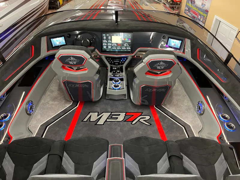 Slide: The Image of 2021 Daves Custom Boats M-37R interior with modern dashboard and seating. - 7