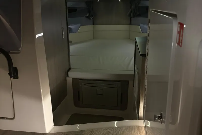 Slide: The Image of Interior cabin of 2025 Navan C30 boat, featuring a cozy sleeping area. - 31