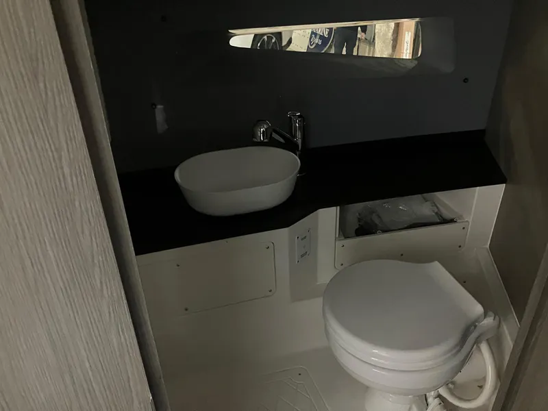 Slide: The Image of Compact bathroom in 2025 Navan C30, featuring modern sink and toilet. - 9