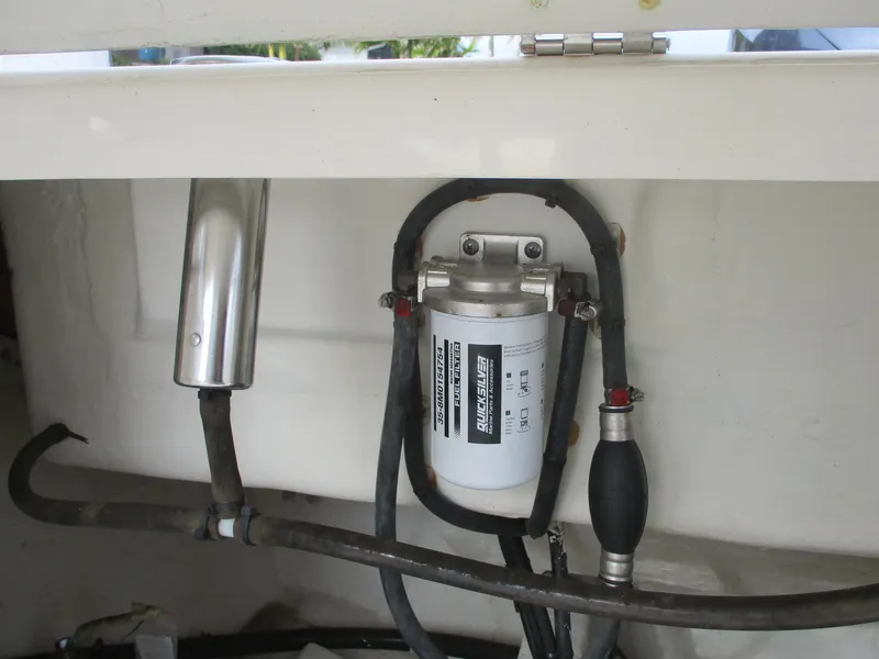Slide: The Image of Fuel filter system on a 2022 Cobia 237 Center Console boat. - 15