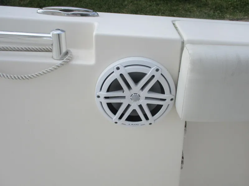 Slide: The Image of 2022 Cobia 237 Center Console boat speaker and railing detail. - 18