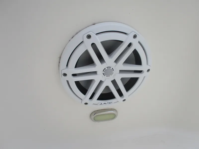 Slide: The Image of Speaker and light fixture on 2022 Cobia 237 Center Console boat. - 19