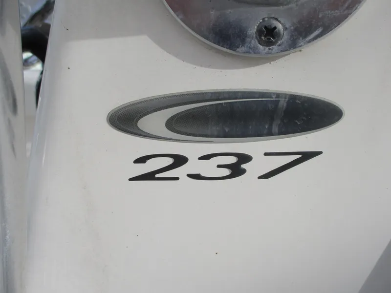 Slide: The Image of Cobia 237 Center Console 2022 boat logo and model number. - 27
