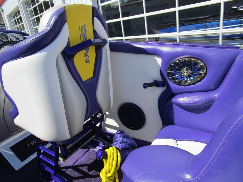 Slide: The Image of Interior of a 2005 Cigarette 39 Top Gun boat with cushioned seating. - 17