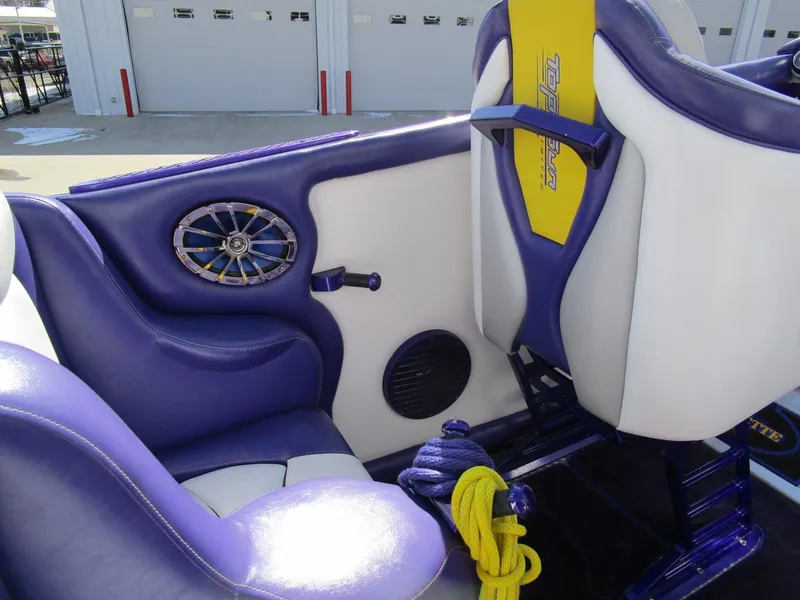 Slide: The Image of 2005 Cigarette 39 Top Gun engine with blue and chrome components. - 21