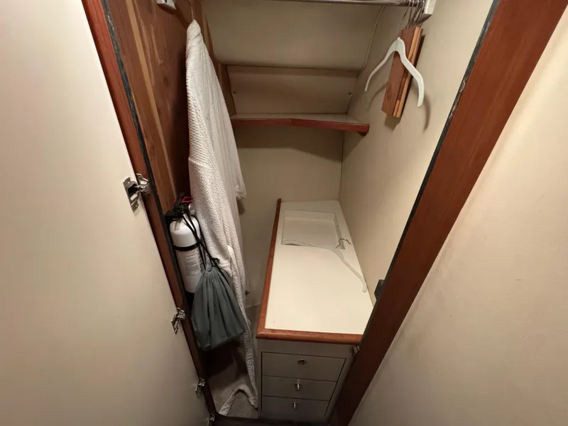 Slide: The Image of Bathroom interior of 1999 Sea Ray 400 Sundancer yacht, featuring shower and sink. - 21