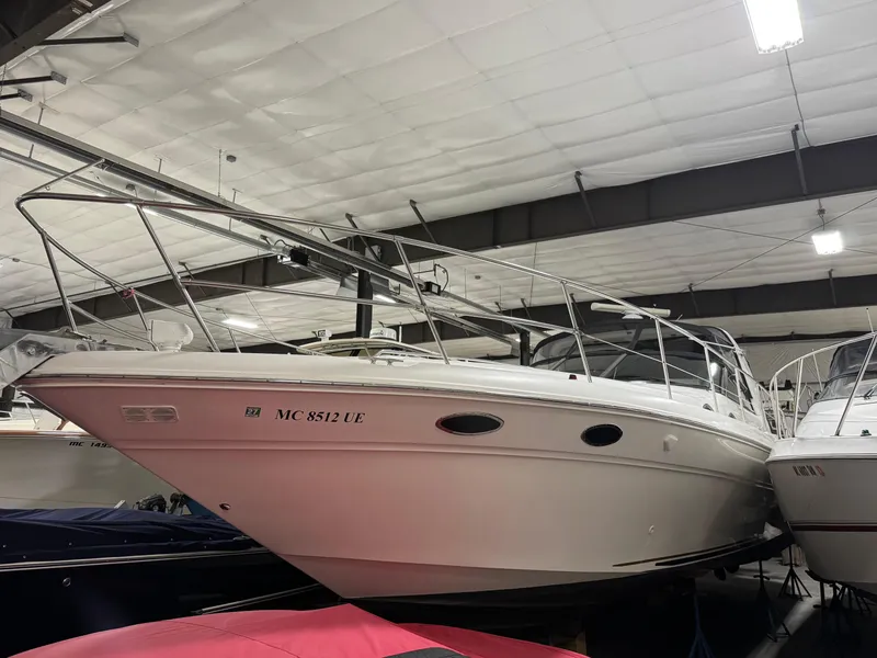 Slide: The Image of 1999 Sea Ray 400 Sundancer yacht in indoor storage facility. - 3