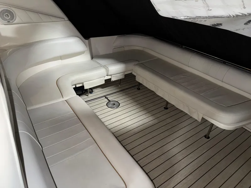 Slide: The Image of Interior of 1999 Sea Ray 400 Sundancer yacht with sink and storage compartments. - 7