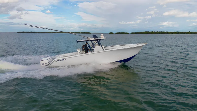 The Image of 2019 SeaHunter 35 Tournament boat cruising on open water. - 1