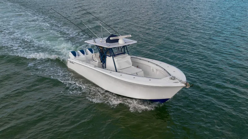 Slide: The Image of 2019 SeaHunter 35 Tournament boat cruising on open water. - 5