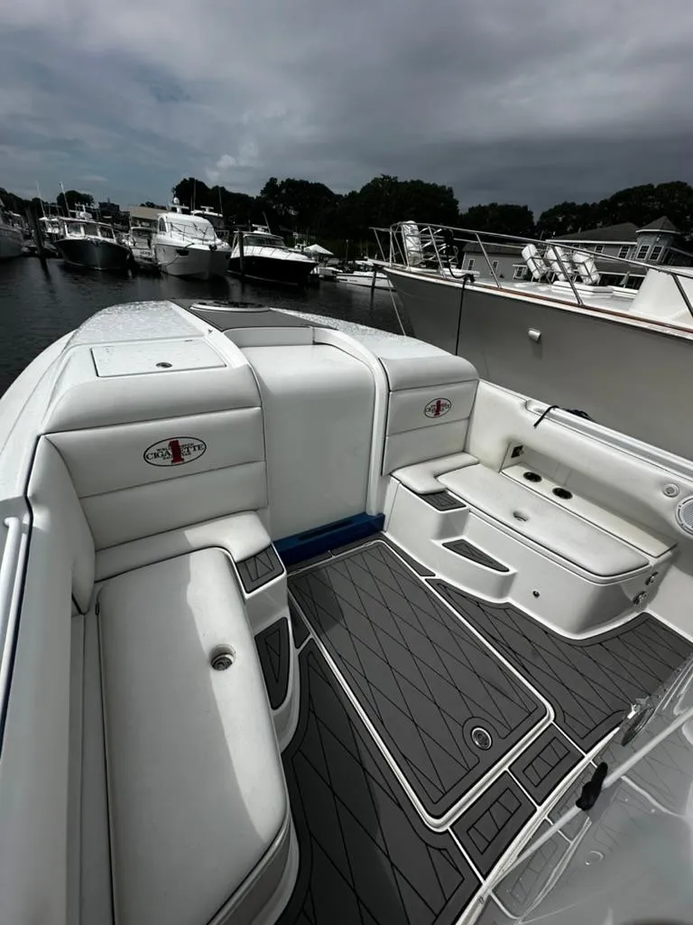 Slide: The Image of 2011 Cigarette 39 TOP FISH boat interior with white seating and gray flooring. - 5