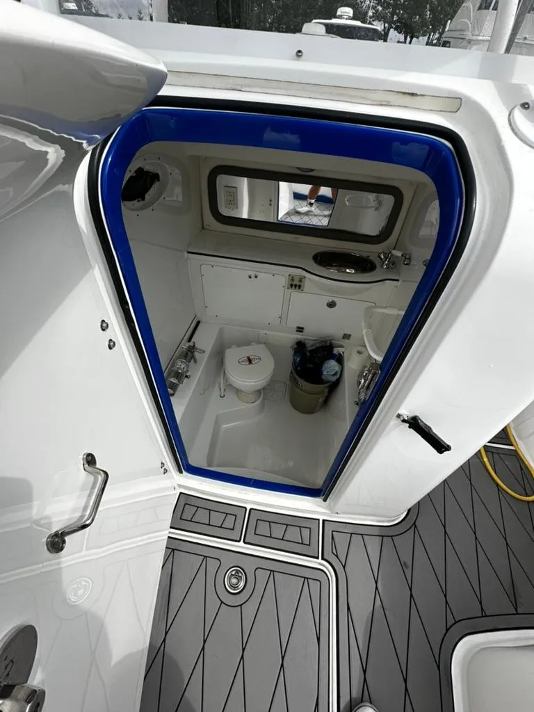 Slide: The Image of 2011 Cigarette 39 TOP FISH boat interior with compact bathroom and modern amenities. - 6